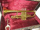 Vintage trumpet with original case. Will look used but does work.This item is not listed as like new condition or even very good condition that is why it is listed as good condition.In good condition but will look used. Vintage item and works.This item