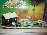 New Ray Country life farm toy set.Factory box is in poor condition but item inside box is in like new condition.In factory box but box is in poor condition. The item inside the box is in like new condition.