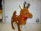 Vintage battery operated red noise reindeer. The reindeer plays music and red noise lights up. The reindeer will not walk anymore.In original factory box. In very good condition. The reindeer plays songs and red noise lights up only. "The reindeer wi