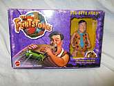 The Flintstones Big Bit Fred Figure with accessories. He takes A big Bite for a Big Appetite! New old stock but factory box will not be in perfect condition. Box never opened. Playset.
