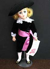 This wonderful doll has never been taken out of the box, except for these photos.  It is in excellent condition.The 12