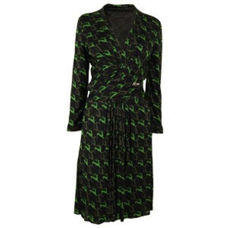 This dress is a beauty with the unusual green stag  print.  It has pleats down the middle front of the skirt, and the bodice is somewhat low cut and has an attatched belt.  Zips on the side. size 42