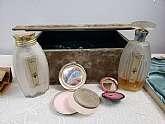 Vintage Art Deco Vanity Set Silver Compacts, Perfume Bottles, Powder Talc, Blush Make UpIn Green Velvet BoxIn Good to Fair condition, needs cleaned, missing some of the items in pkg. the glass bottles are not broken but the top on the powder has splitt