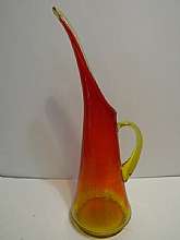 Vintage Crackle Glass Orange Kanawha Art Glass Vase/PitcherNo chips or cracks, in good conditionMeasures 14.5"H x 5"WThank YouAt first Kanawha produced colorless cut and etched glass items. By the 1960’s it competed wi