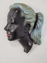 Vintage Women Head black with White Ponytail Cortendorf Wall Mask Pottery ceramic In good condition with a chip at the bottom but not noticeable when hanging.  Some minor wear and scratches has heavy caked dust on the top of the head from years of hangi