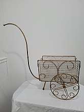 Mid Century Modern Magazine Rack Mesh White and Gold Metal Vintage Rolling Cart Sunroom Garden Room DecorMeasures overall  28"H x 30"W the cart magazine rack part 13"H and 11"WIn good condition wear, stains and spots to the finish,