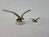 Mid Century Modern Seagull Brass Sculpture Statue Table Top Art White Marble Base Ocean Beach DecorIn good condition, original from the 70's.Great for the collector and Beach or Ocean theme decorMeasures 7 x 3.5  an d the small one 3.5 x 1.5"
