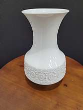 Vintage White Ceramic Vase Royal Porzellan KPM Germany HandarbeitIn good condition minor wear and scratchesA white simple vase with a beautiful design great for any place any decor and will sure be an eye catcher.Measures 8"H x 5"WThank