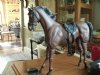 vintage Louis Marx & co. horse. hard plastic with movable legs,saddle & saddle bags plus bridle.