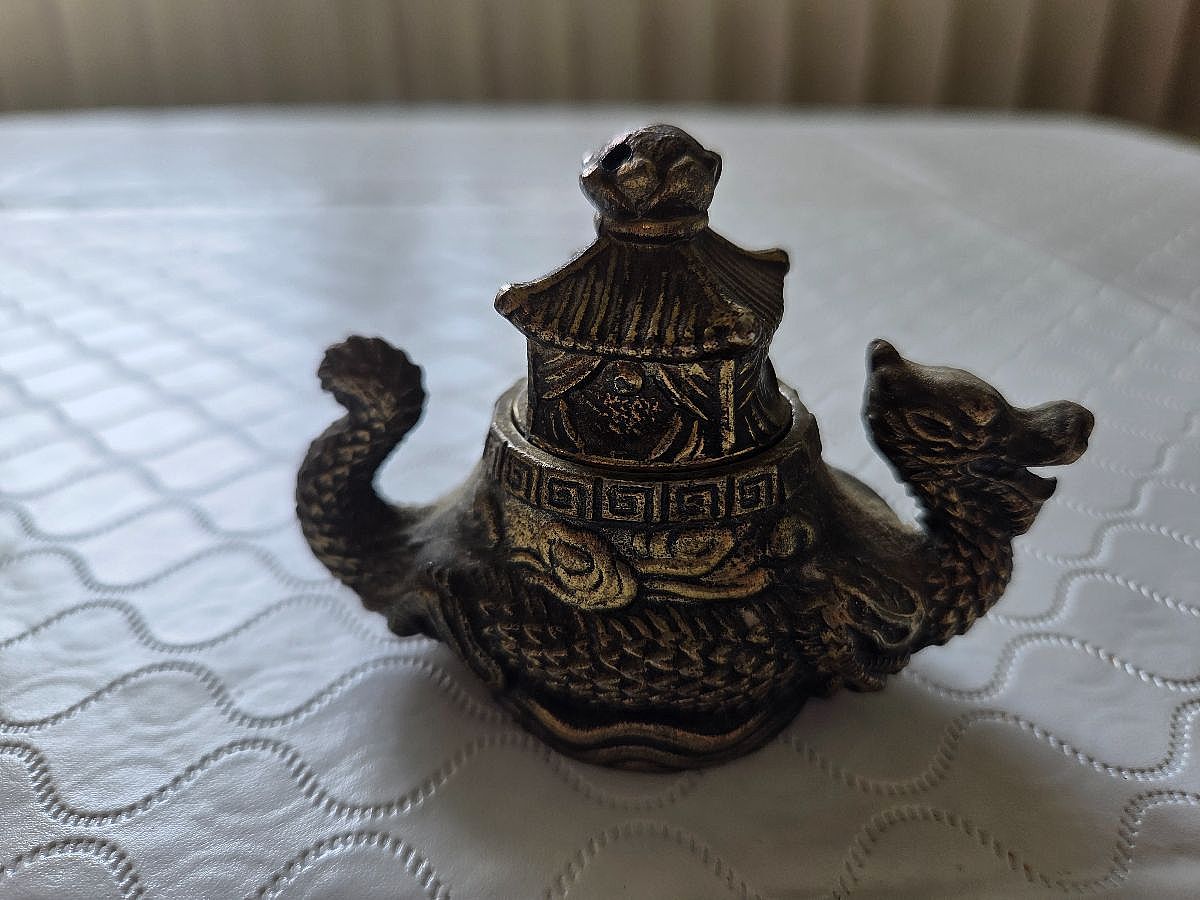 Mid-century Japanese brass dragon boat censer with pagoda styling, clean inner basin, ready to use or display.