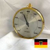 It's a lovely vintage hygrometer made in West Germany from most probably 1970's or 80's.
