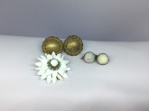 Dome shape gilt cabochon textured clip-on earrings; Dome grayish stone, dog-tooth prong setting with screw on flexible hoop earrings; Milk glass floral brooch multi-layers of pedals