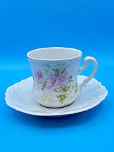 Pink and White Vintage Floral Demitasse Tea Cup and Saucer from AustriaThis cup would be so charming even sitting on a table with some wild flowers in it.There are not real conditions to be aware of other than the gilding worn away on the handle and d