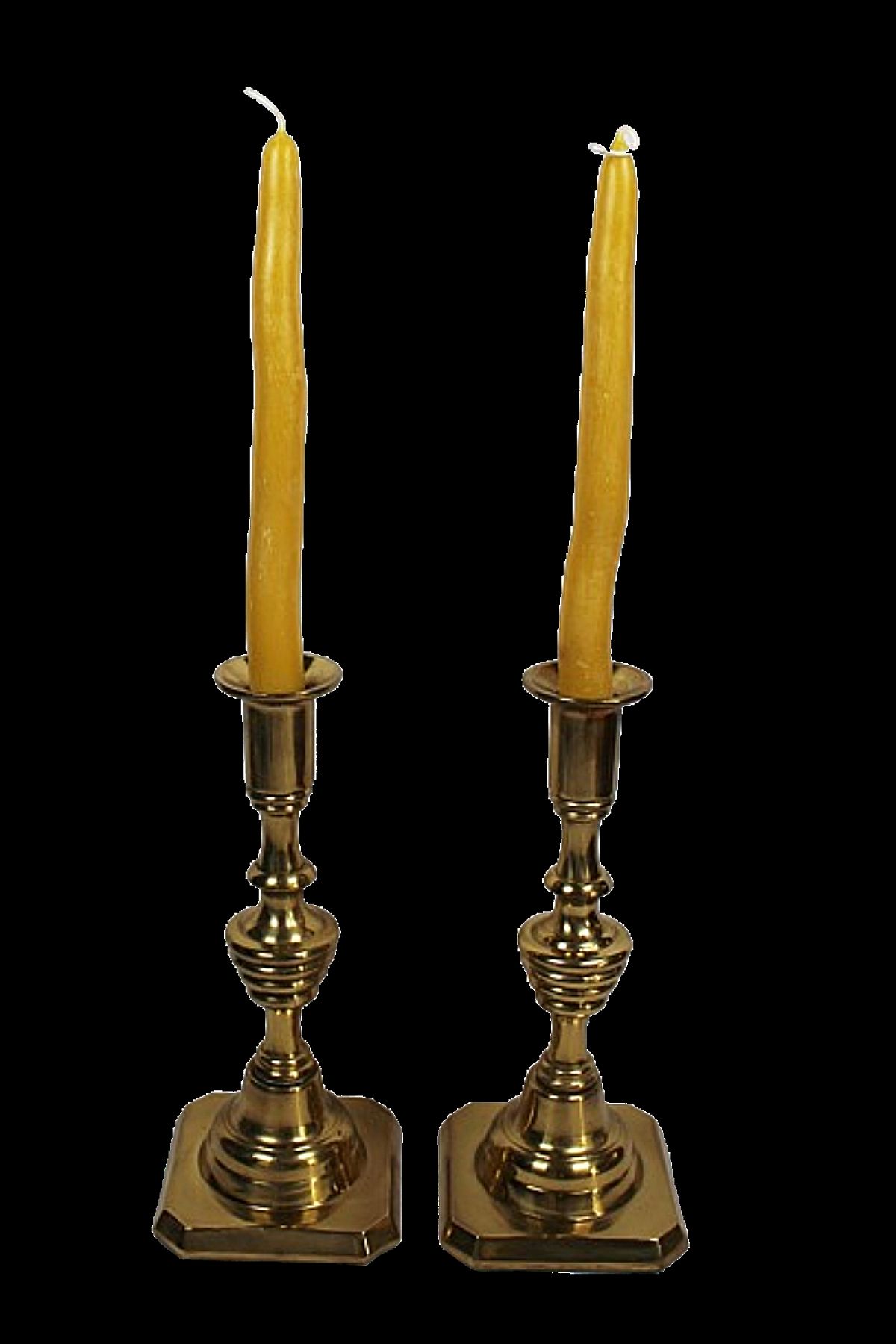 This handsome pair of brass candlesticks were made in England. Cast in two parts, they are true beehive design sticks, with a central inverted beehive turning and no other decorations (such as a faceted knob above the beehive). 