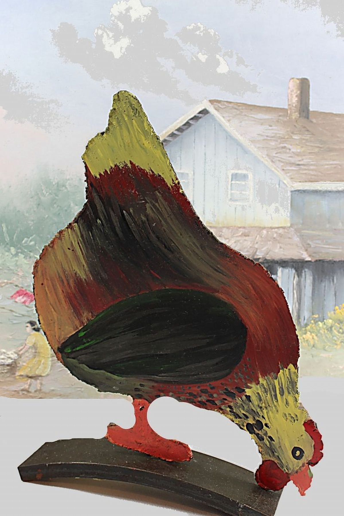 A great piece of country folk art, this double-sided pecking chicken doorstop has so much personality! It was hand cut out of sheet iron and hand painted, one side in yellow, orange, green and red; the other side is a completely different bird 