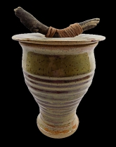 August (Gus) Lukow (1954-2020) of Frederick, Maryland created this lidded stoneware vase in 2011. Gus earned a Master's in Chemistry at Hope College in Michigan and taught for many years while he created art pottery and paintings.