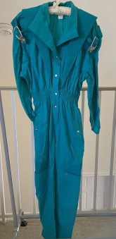 Vintage 80's Jumpsuit, topaz blue 100% cotton by IIF in excellent condition.   Featuring snap front, long sleeves, front pockets, ruched waist, ribbed accents and silver buckles. Size S