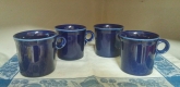   Nice set of 4 dark blue Fiesta Ware mugs.  8 oz. size