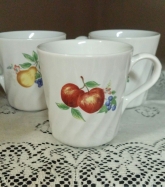   Set of 4 small Corelle ware cups with fruit patterns 