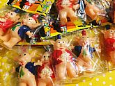Plastic toy pigs in a cute header bag. 