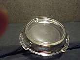 Unmarked, clear, no pattern, punch bowl stand by Anchor Hocking Glass; Circa 1948-1960 Size: 1-1/2 inches height, 5-1/8 inches across rim, 6-3/4 inches across base; for a 4-7/8 inch or less punch...No chip's or crack. Like new condition!