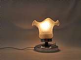 A beautiful vintage night light. It was made in the 70s from wood and a beautiful embossed glass shade. These beautiful floor lamps are the perfect vintage touch for any room. They are decorative vintage pieces that emit a soft and soothing light when ill