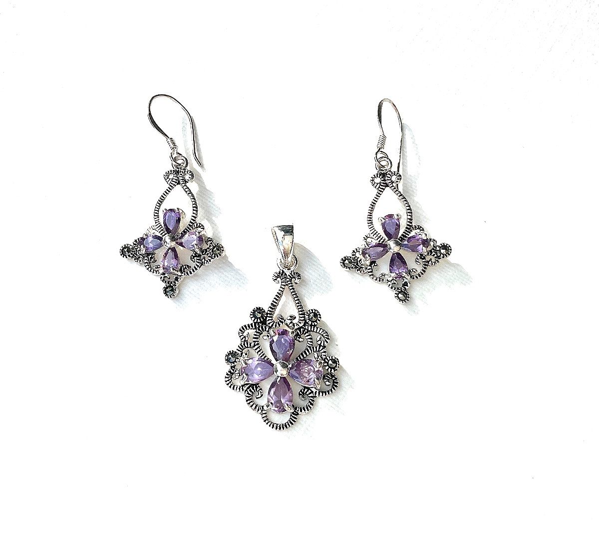 Gift from my Grandmother in 1980's-1990. Stamped "925". Lovely & in Excellent Condition. Beautiful light purple amethyst pendant & earrings, in lovely marcasite setting.