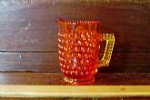 Mid Century Art Glass was an explosion of color, shape, size and variety. It was also contagiously popular, as more and more companies could produce both nouveau and traditional designs more inexpensively, so that the average American household could affo