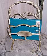 This is one of the best representations of shabby or Cottage Chic I have found!  I so love this uniquely twisted iron magazine rack!  Measuring 20" tall, 12" wide and 10" deep, it sits chairside or spotlighted with all the reading material