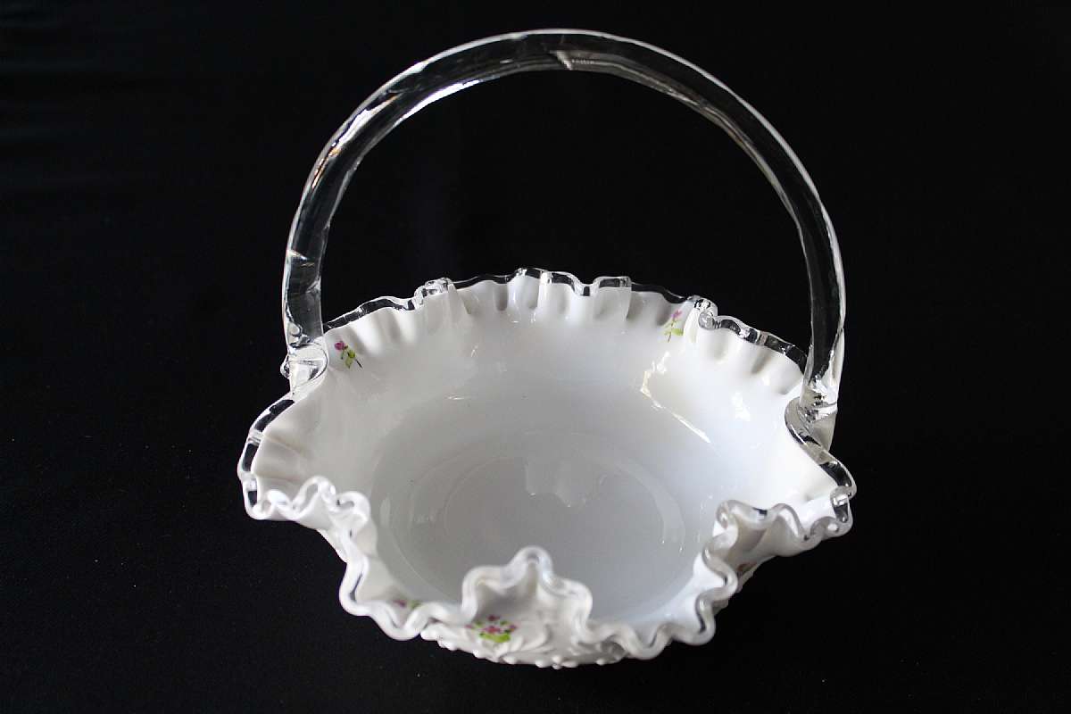 Up for sale is this Fenton Glass Basket Signed By Artist J. Stevens in excellent condition with no chips or cracks. The basket measures approx. 8 3/8"W by 7 3/4"T. Shipping Excludes: Alaska/Hawaii, US Protectorates, APO/FPO, PO BoxShipping Pro