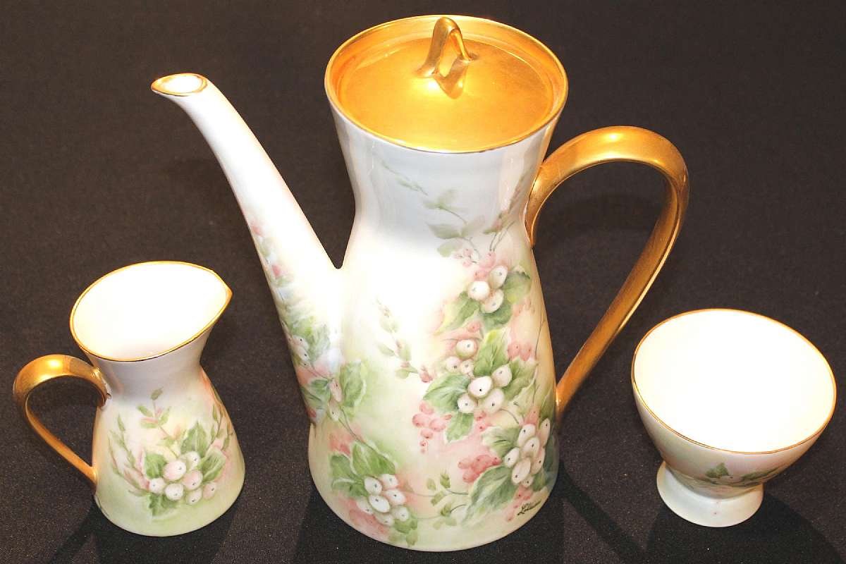 Up for sale is this beautiful vintage Rosenthal Coffee Pot With Matching Cream & Sugar. Rare find. The pot measures approx. 8 3/4" T without the lid. The sugar bowl is 3"T and the creamer is 4 1/2"T. Nice matching set that is in excelle