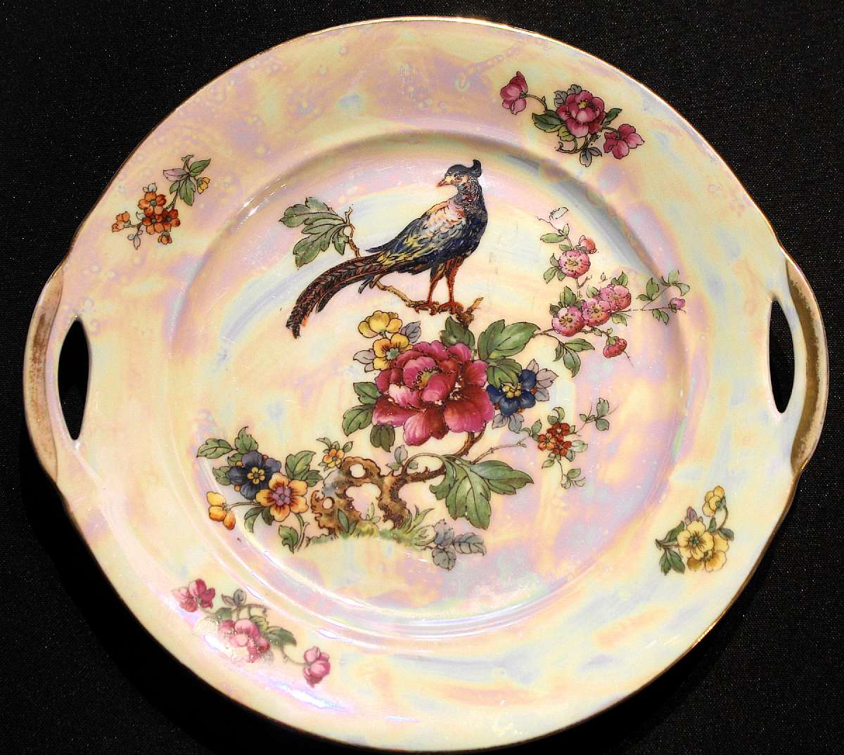 Up for sale are these Rare Vintage Beautiful Czechoslovakia CZE102 Iridescent Handled Serving Plate. It measures approx. 9" by 9 5/8".  There are no chips or cracks. There is some minor gold trim wear.  Shipping Excludes: Alaska/Hawaii, US Prot