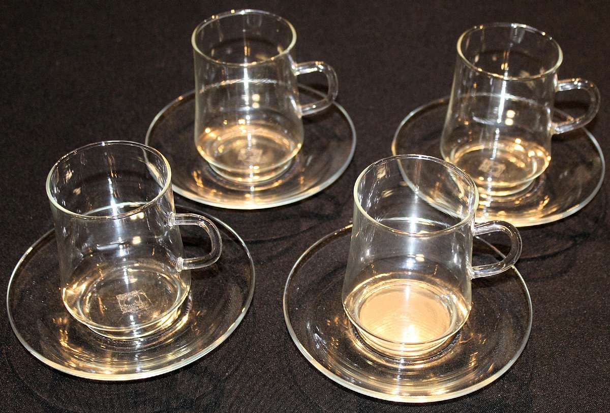 Up for sale are these Schott Mainz Jena Glas Set Of Four Cups & Saucers in great condition with no chips or cracks. The saucers measure approx. 5 3/8"W and the cups are 3 5/8"T by 2 1/2"W.   Shipping Excludes: Alaska/Hawaii, US Protect
