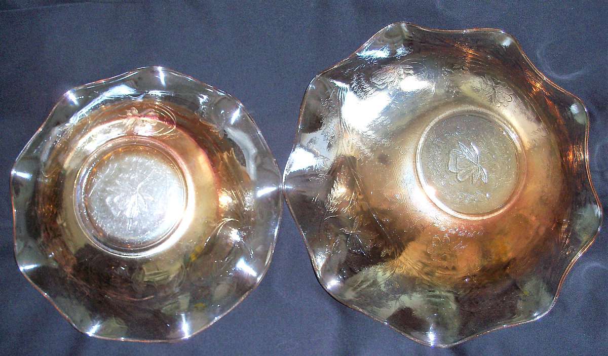 Up for sale are these Vintage Jeannette Louisa Iridescent Glass Serving Bowls in great condition with no chips or cracks. The large one measures approx. 12"W by 3 1/4'T and the small one approx. 9 1/2"W by 2 1/2"T.   Shipping Excludes: Ala
