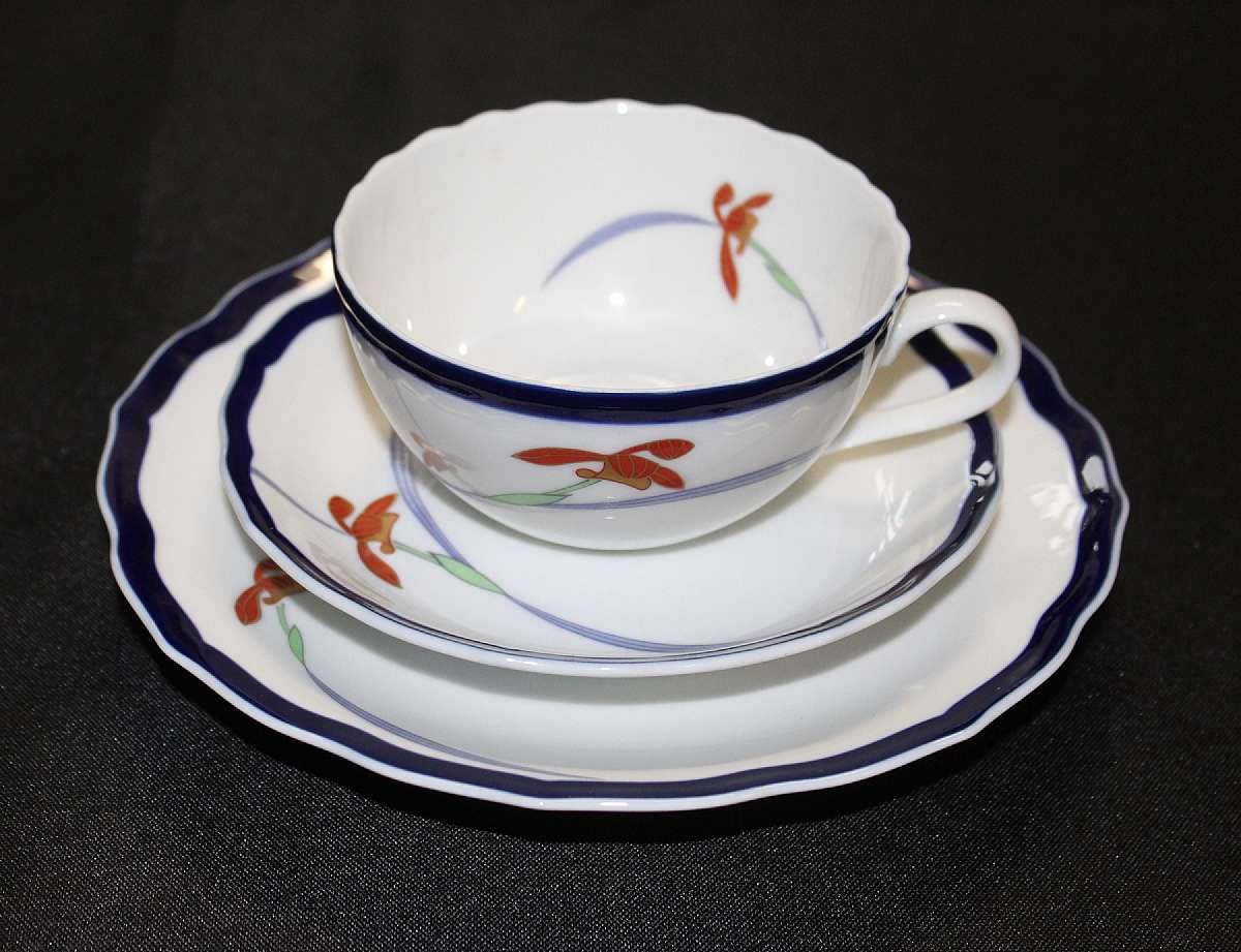 Up for sale is  this Koransha Japan Orchid Cup Saucer & Plate Trio in excellent condition with no chips or cracks. The plate measures approx. 7 1/2"W, the saucer 5 3/4"W and the cup is 2"T by 4"W.   Shipping Excludes: Alaska/Hawai