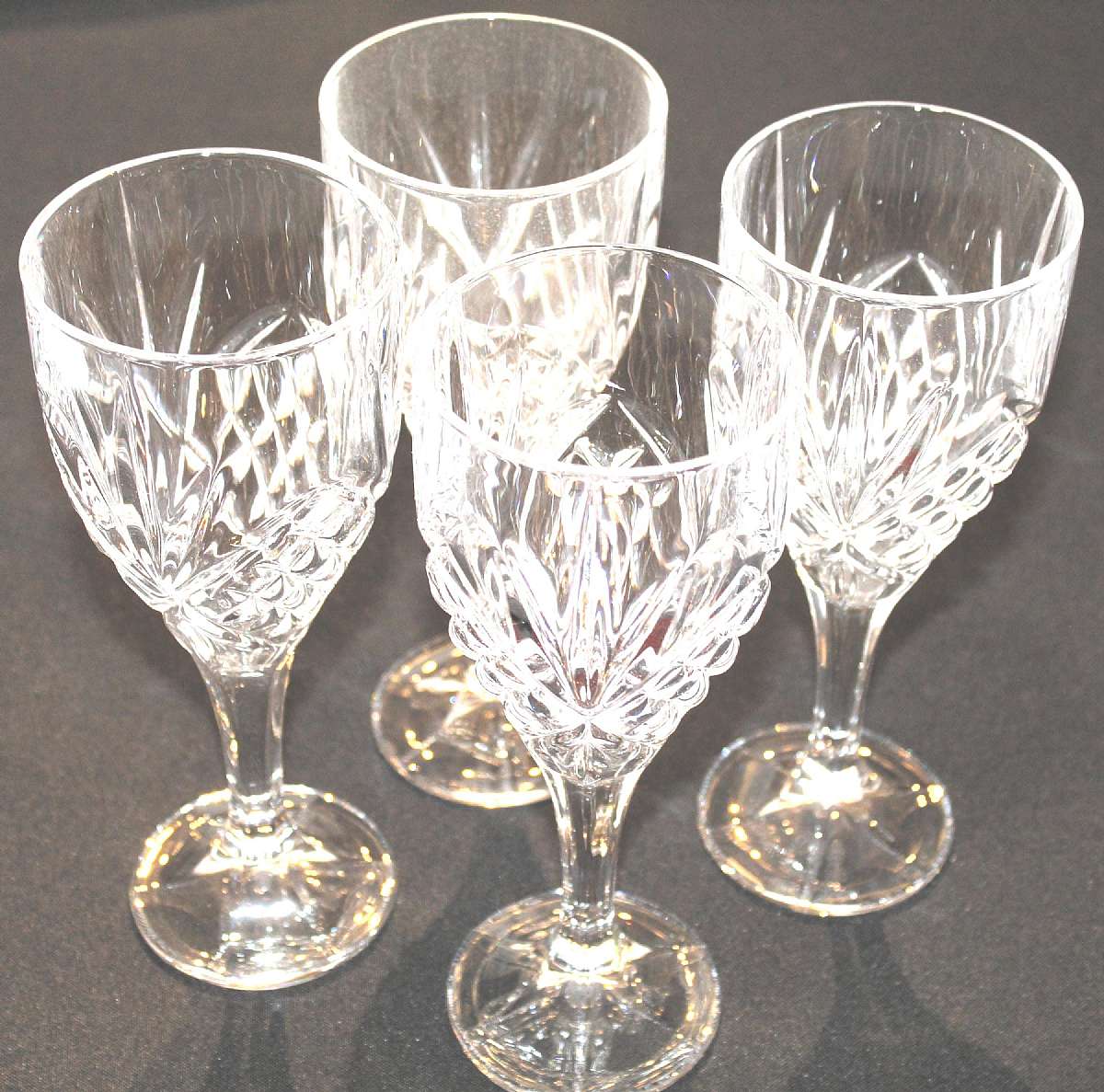 Up for sale are these Godinger Dublin Set of Four Goblet Crystal Glasses in excellent condition with no chips or cracks. The Glasses measure approx. 8"T by 3"WShipping Excludes: Alaska/Hawaii, US Protectorates, APO/FPO, PO BoxShipping Provided