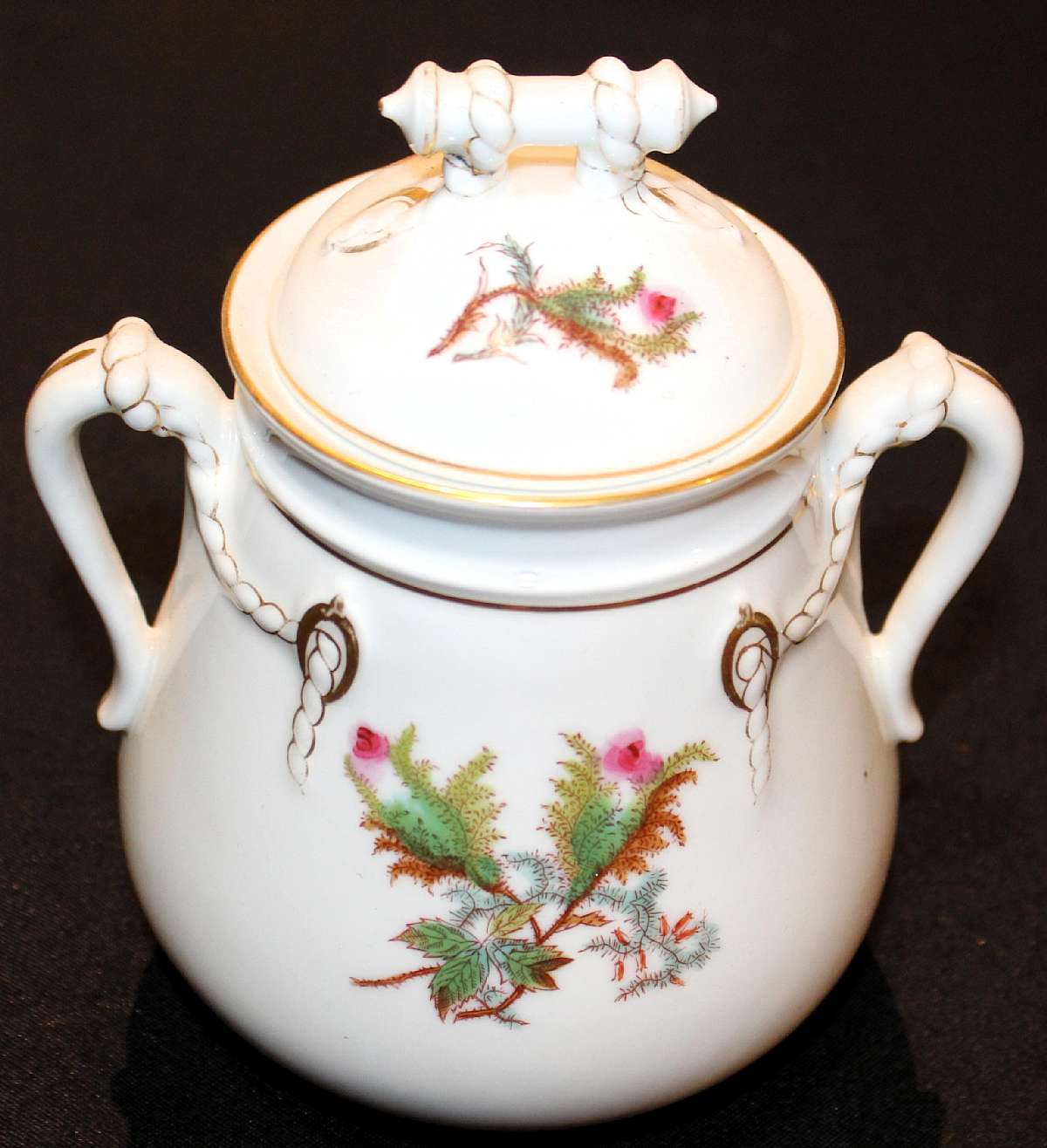Up for sale is this Haviland & Co Limoges Moss Rose Gold Trim Antique Large Sugar Bowl And Lid. Without the lid it measures approx. 5 3/8"T and it holds approx. 32 ounces. This is in great condition with minor gold wear and no chips or cracks. Ni