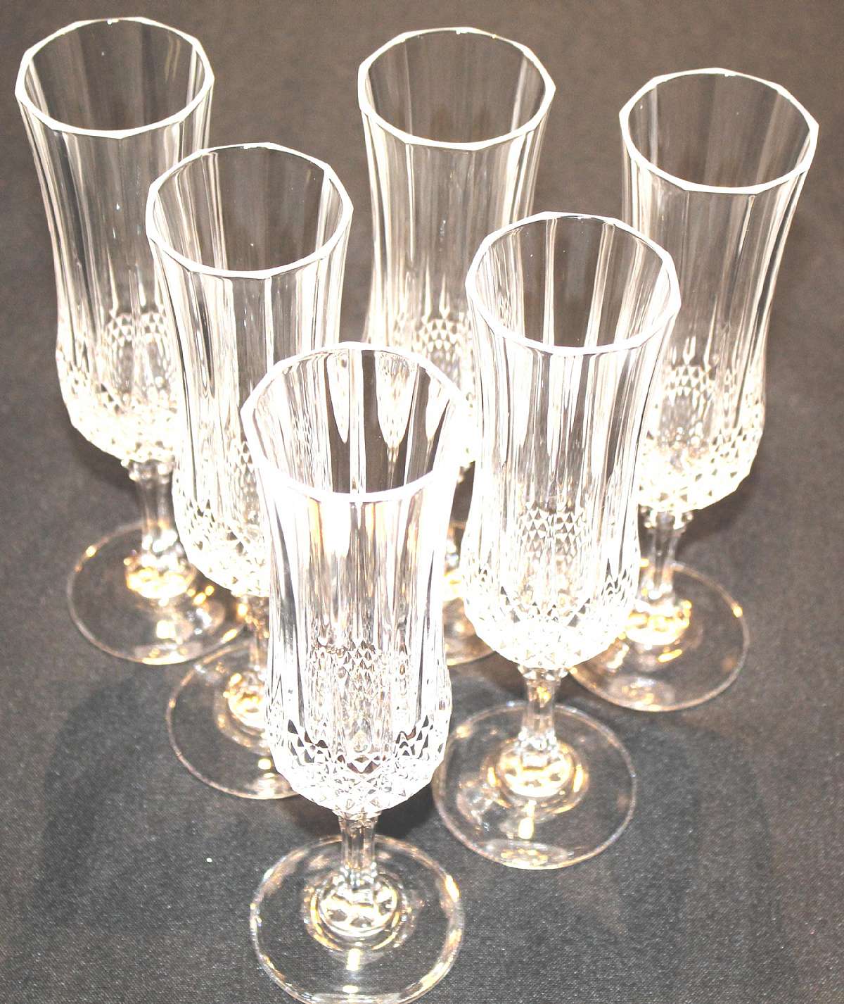 Up for sale are these Cristal D'Arques Durand Longchamp Set Of Six Fluted Champagne Glasses in excellent condition with no chips or cracks. The glasses measure approx. 8 1/8"T by 2"W.Shipping Excludes: Alaska/Hawaii, US Protectorates, APO/FPO,