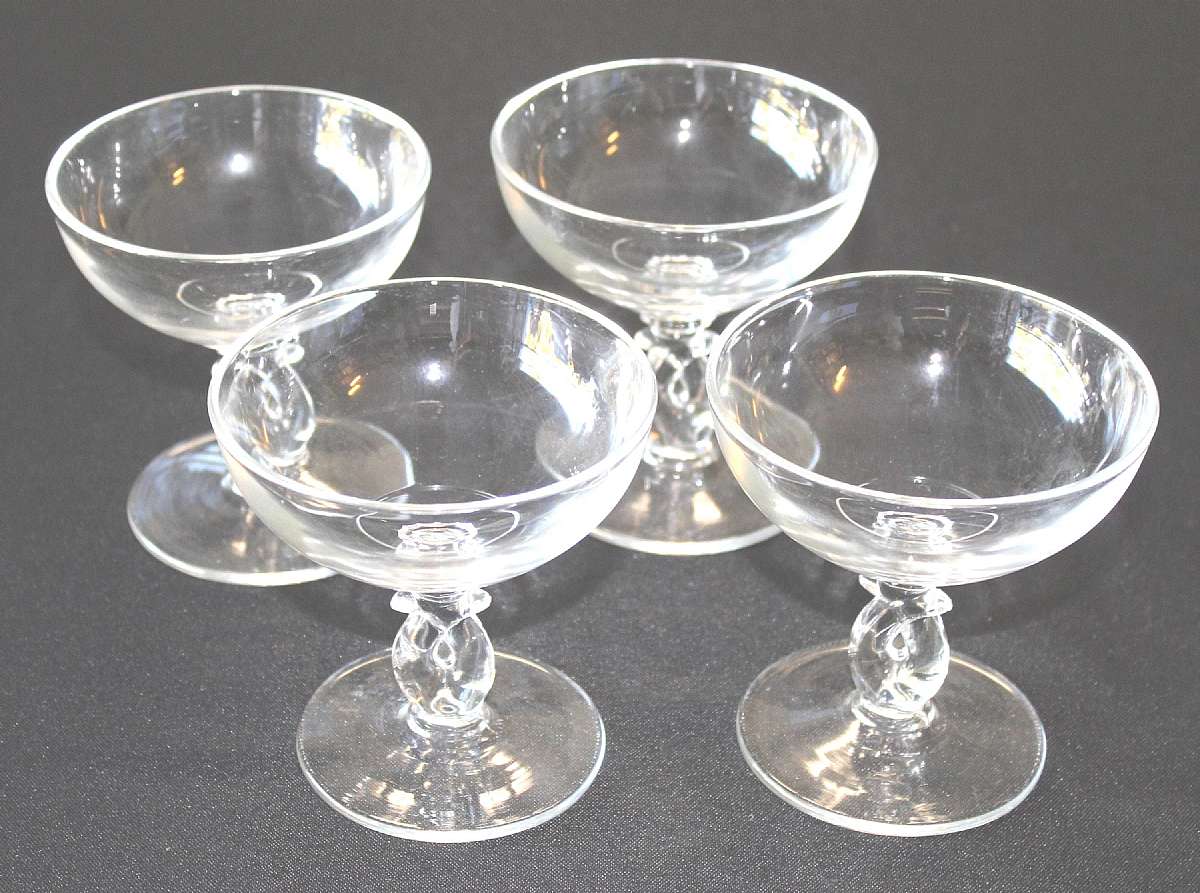 Up for sale are these Heisey Lariat Set Of Four Champagne/Sherbet Glasses in great condition with no chips or cracks. They measure approx. 4"T by 3 7/8"W.Shipping Excludes: Alaska/Hawaii, US Protectorates, APO/FPO, PO BOXShipping Provided to t
