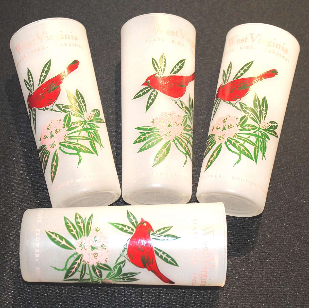 Up for sale are these West Virginia State Bird & Flower Set Of Four Frosted Tumblers in excellent condition with no chips or cracks. They measure approx. 6 1/2 inches tall and 2 3/4 inches wide. Shipping Excludes: Alaska/Hawaii, US Protectorates, APO
