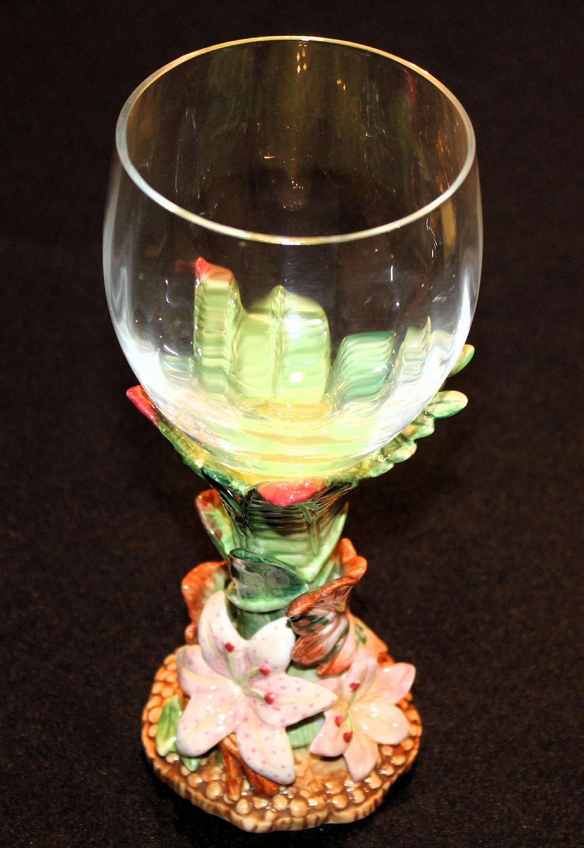 Up for sale is this Fitz & Floyd Exotic Jungle Goblet Glass in excellent condition with no chips or cracks. Measures approx. 8 1/4"T by 3 1/4"W.Shipping Excludes: Alaska/Hawaii, US Protectorates, APO/FPO, PO BoxShipping Provided to the Uni