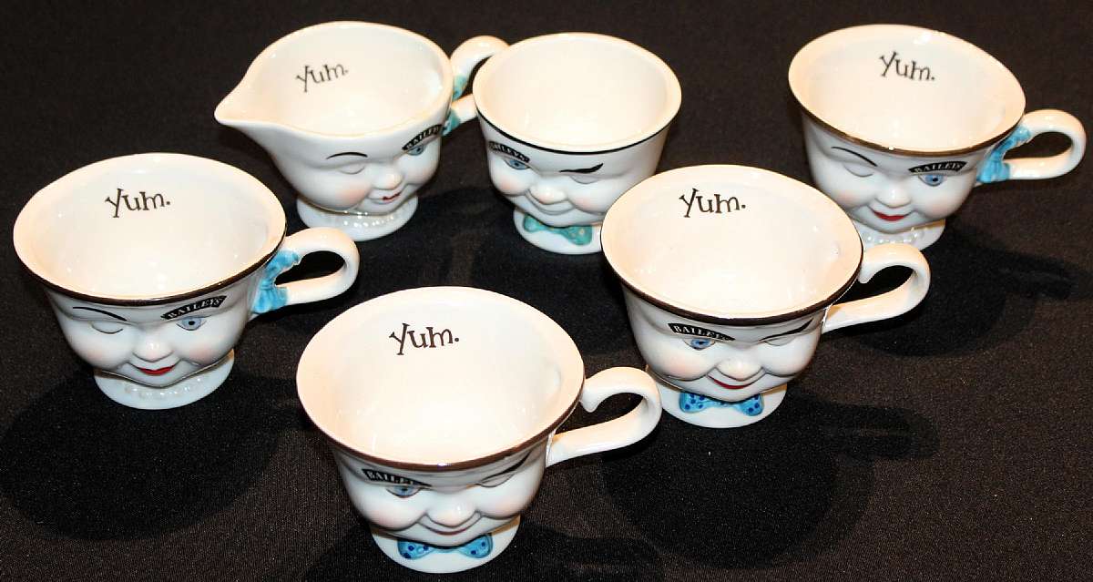 Up for sale are these Four Vintage Baileys Irish Cream Yum Face Mugs Plus a Creamer & Sugar Bowl in excellent condition with no chips or cracks. The mugs measure approx. 3"T by 4"W. Shipping Excludes: Alaska/Hawaii, US Protectorates, APO/FP