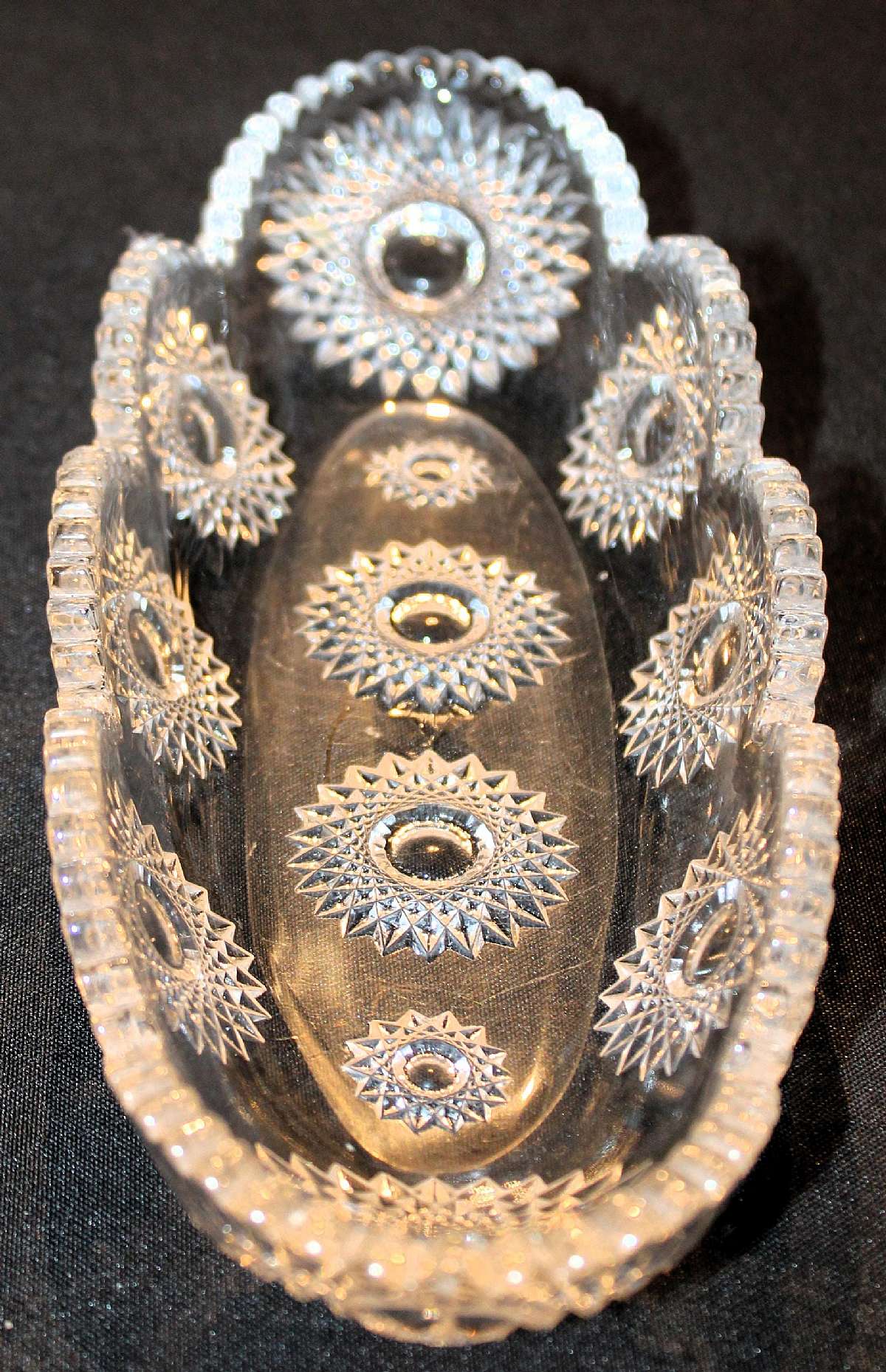 Up for sale is this Heisey Sunburst Marked Celery Dish. It measures approx. 11 3/4"L by about 4 1/2"W. No chips or cracks. Some utensil marks from use. Marked with the H in a diamond. Shipping Excludes: Alaska/Hawaii, US Protectorates, APO/FPO,