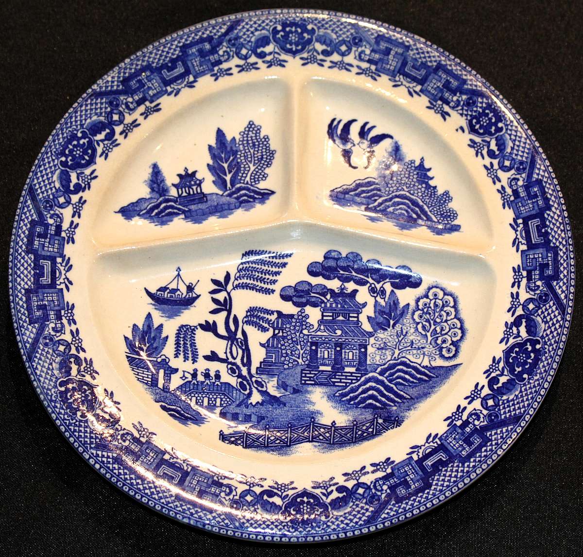 Up for sale is this Rare Vintage Japan Blue Willow Grill Plate Transferware. There are no chips or cracks.  Measures approx. 9 7/8"W.Shipping Excludes: Alaska/Hawaii, US Protectorates, APO/FPO, PO Box Shipping Provided to the United States Only.