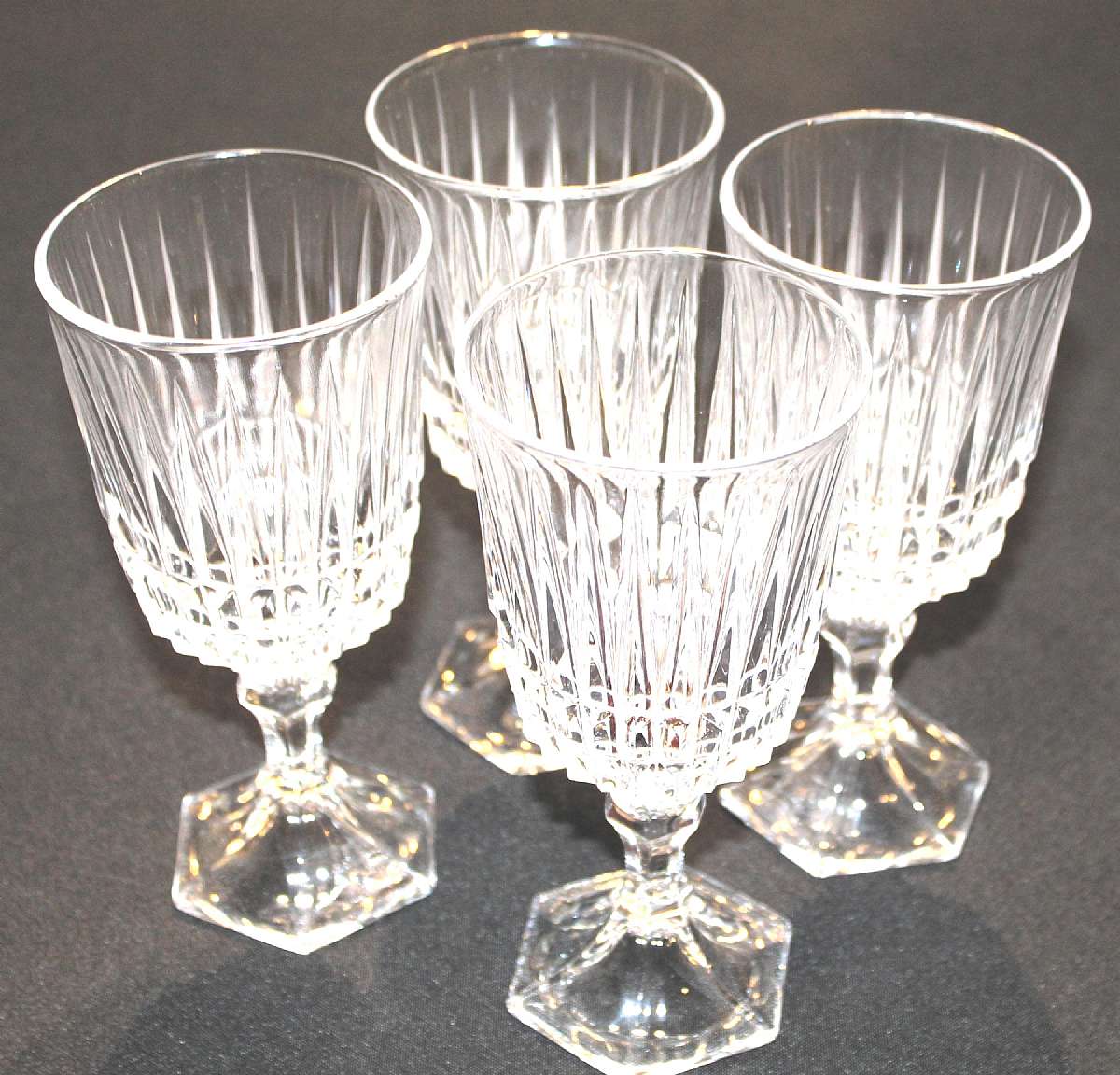 Up for sale are these Fostoria Heritage Clear Set Of Four Water Goblets in excellent condition with no chips or cracks. They measure approx. 7 1/4" Tall by 3 1/4"W.  Shipping Excludes: Alaska/Hawaii, US Protectorates, APO/FPO, PO BoxShipping P
