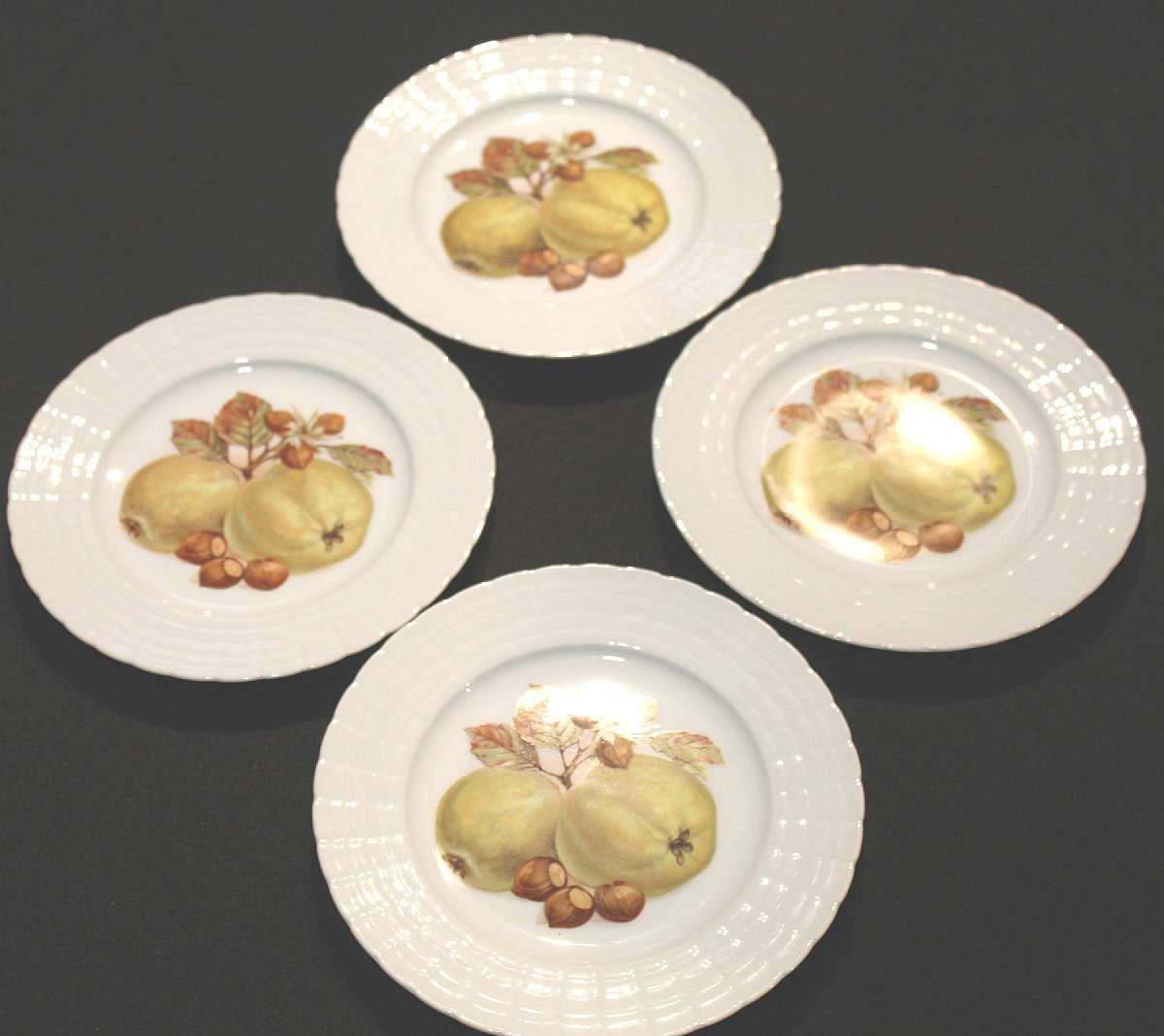 Up for sale are these Hutschenreuther Germany Quince & Hazelnut Set of Four Plates in excellent condition with no chips or cracks. The plates measure approx. 8"W.   Shipping Excludes: Alaska/Hawaii, US Protectorates, APO/FPO, PO BoxShipping Pro