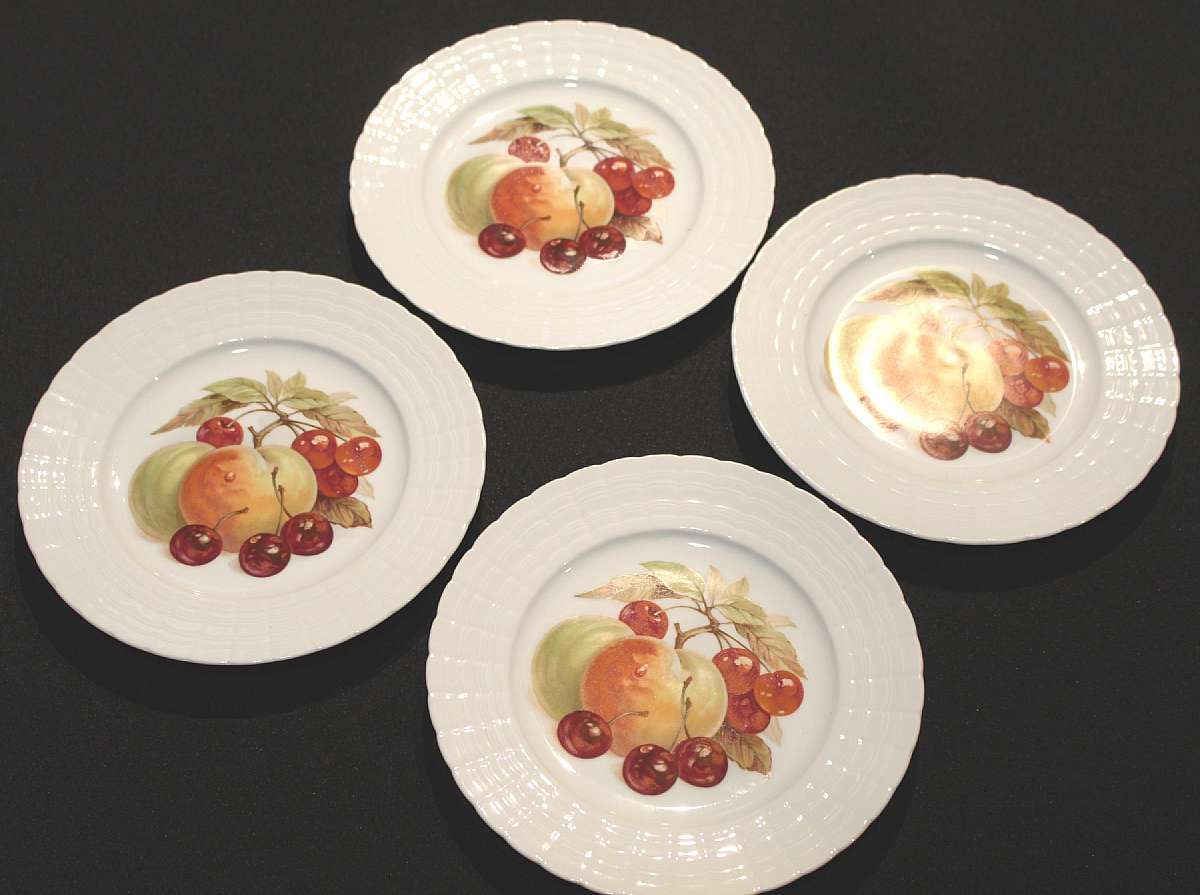 Up for sale are these Hutschenreuther Germany Peach & Cherry Set of Four Plates in excellent condition with no chips or cracks. The plates measure approx. 8"W.   Shipping Excludes: Alaska/Hawaii, US Protectorates, APO/FPO, PO BoxShipping Provid