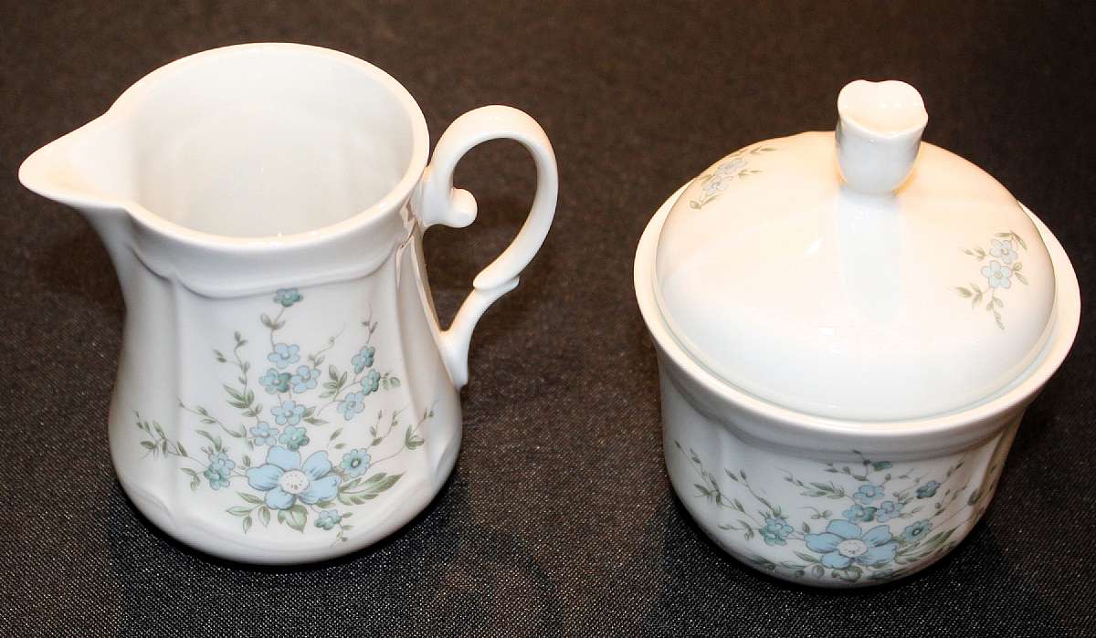 Up for sale is this Johann Seltmann Vintage Blue Floral Creamer & Covered Sugar Bowl in excellent condition with no chips or cracks. The Creamer measures approx. 3 1/2"T & the sugar bowl is 2 1/2"T without the lid. Please see my other sales for more of th