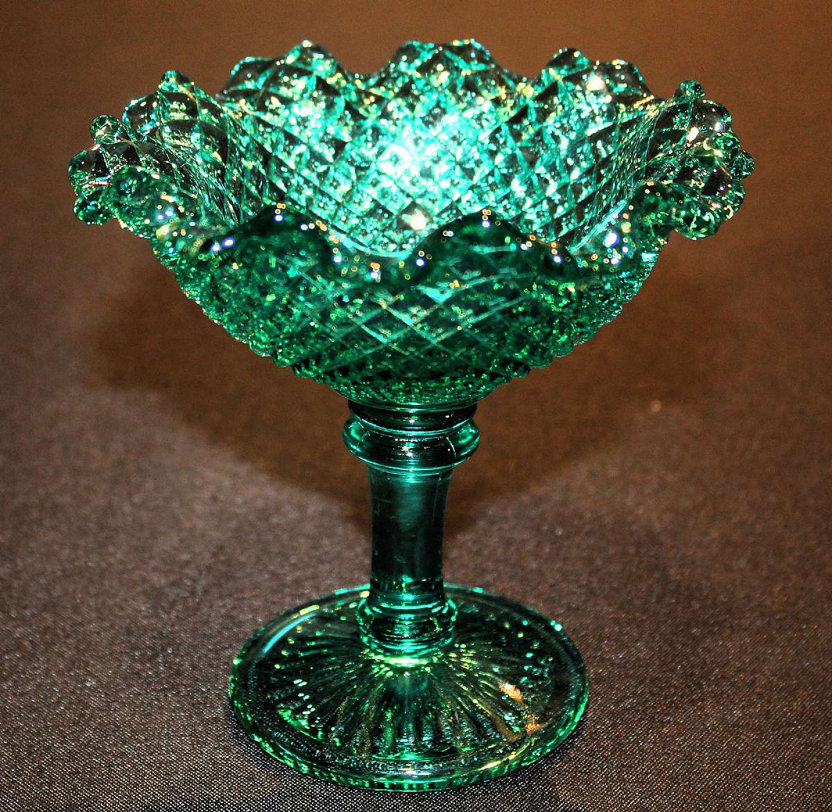 Up for sale is this Westmoreland English Hobnail Vintage Compote excellent condition with no chips or cracks. The Compote measures approx. 5 1/4"W by 5 1/2"T. Shipping Excludes: Alaska/Hawaii, US Protectorates, APO/FPO, PO BoxShipping Provided