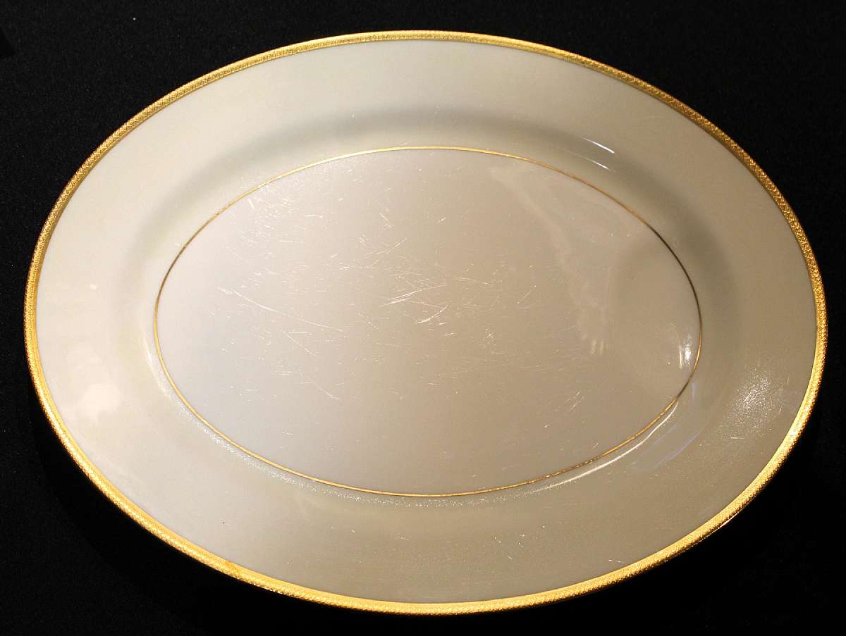 Up for sale is this Theodore Haviland Milford Large Sixteen Inch Platter in great condition with no chips or cracks. Circa 1951. Measures approx. 16 3/8"L by 13"W. Some utensil marks from use. Please see my other sales for more of this pattern.